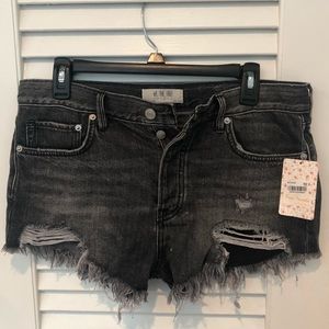 Never worn Free People black distressed shorts